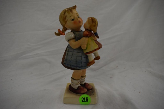 Hummel girl and doll figurine