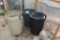 (4) garbage cans , located in Building 94
