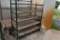 Metal rolling 5 tier shelf unit , located in Building 94