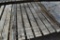 Germination tubes and wooden greenhouse garden bench with natural gas hot water heater