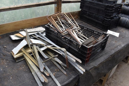 assortment of metal signs- markers and stands, located in Building 94