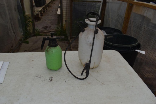 2 hand sprayers, located in Building 94