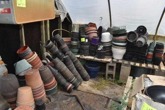 Large assortment of used pots and planters, located in GH 9
