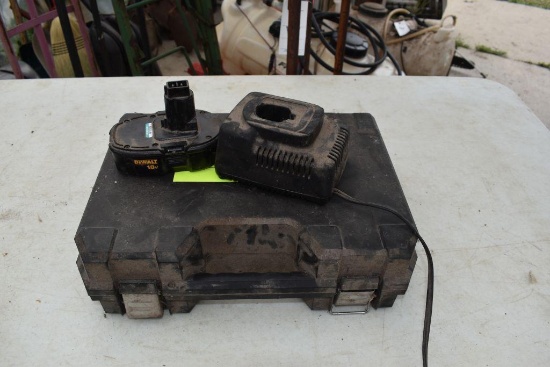 DeWalt 14.4v charger with 18v battery in case , located in Building 94
