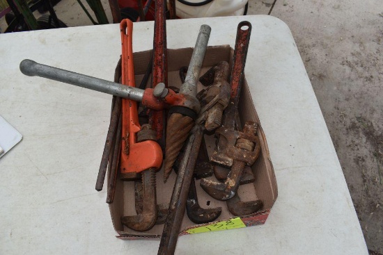 Large assortment of pipe wrenches , located in Building 94