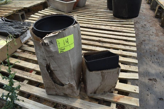 Two boxes of unused pots, located in GH 9
