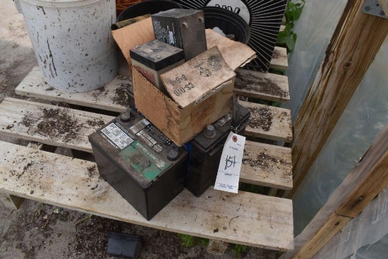 (4) used batteries , located in Building 94