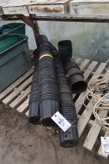 Assortment of planter pots , located in Building 94
