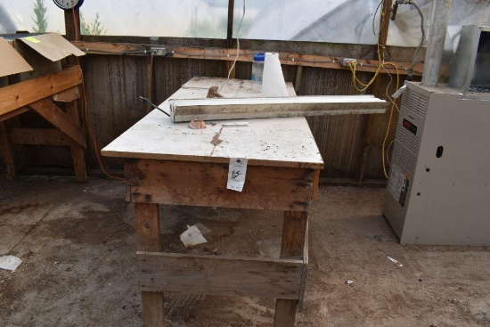 Wooden homemade 30"x6' table , located in Building 94
