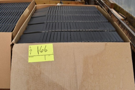 Unused plastic planter pots, located in Building 94