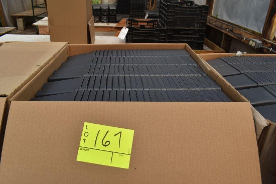 Unused plastic planter pots, located in Building 94