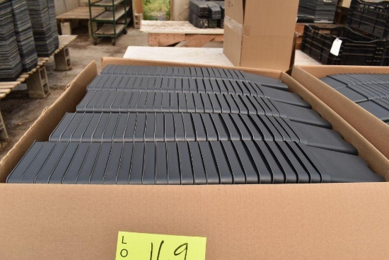 Unused plastic planter pots, located in Building 94