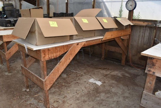 Wooden homemade 30"x8' table , located in Building 94