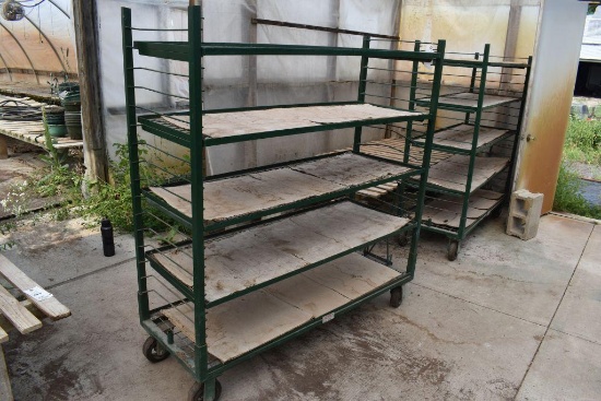Metal rolling 5 tier shelf unit , located in Building 94