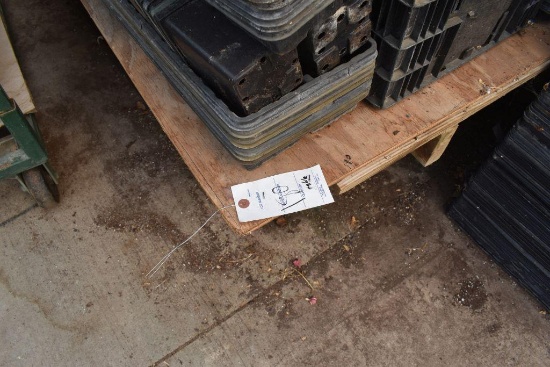Wooden greenhouse garden bench with plywood top , located in Building 94