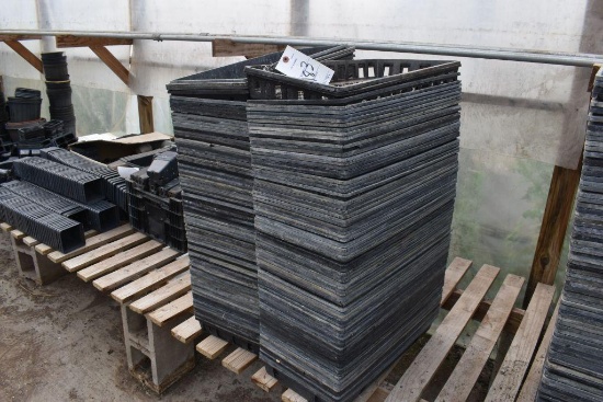 Assortment of planter pots , located in Building 94