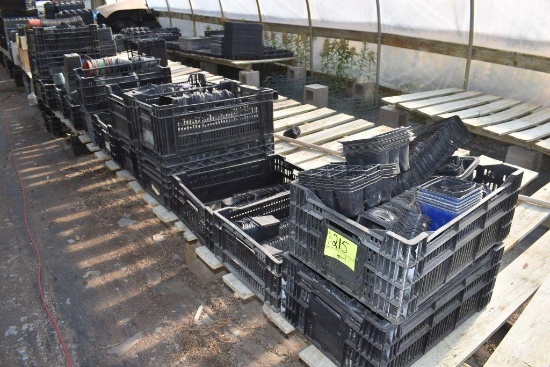 Large amount of planters with carrying crates, some planters damaged , located in GH 197