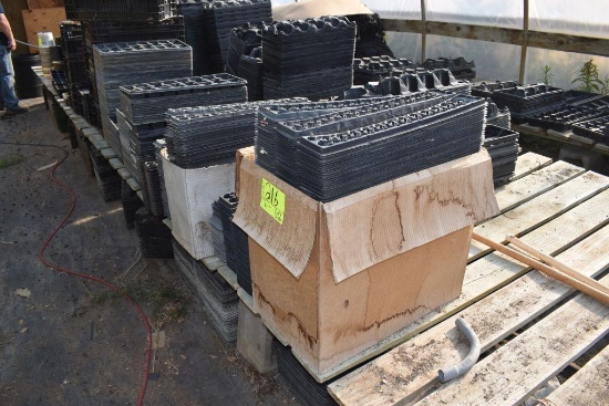 Large amount of planters with carrying crates, some planters damaged , located in GH 197