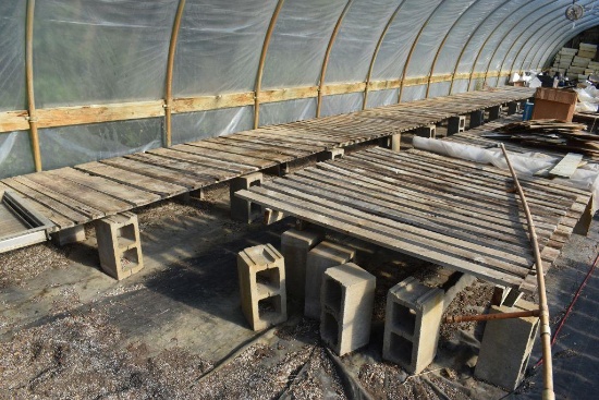 60"x55' and 48"x55' wooden greenhouse garden benches with cinder blocks , located in GH 197
