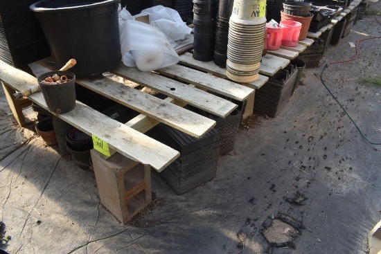 72"x 55' and 48"x 50' wooden greenhouse garden benches with cinder blocks , located in GH 197
