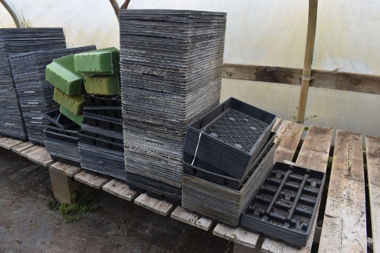Large assortment of plastic plant trays, located in GH 24