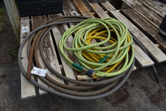 Assortment of garden hose , located in GH 24