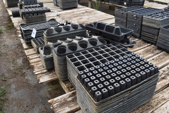 Assortment of plastic plug trays and pots, located in GH 24