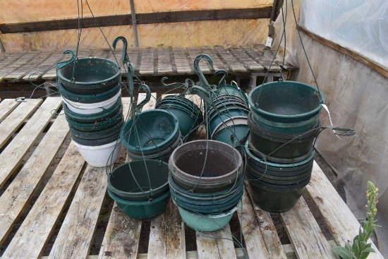 Assorted used hanging plastic pots, located in GH 52