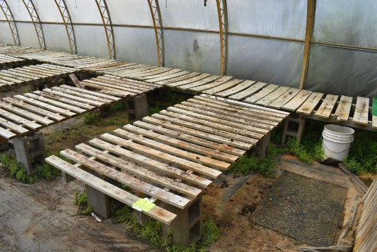 (27) 42"x7' wooden greenhouse garden benches with cinder blocks, located in GH2
