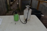 2 hand sprayers, located in Building 94