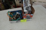 Bungee cords and garbage bags , located in Building 94