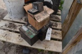 (4) used batteries , located in Building 94