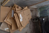 Assortment of used broken down boxes, located in Building 94