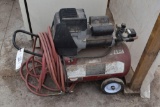Coleman Powermate air compressor, 11 gallon 4hp , located in Building 94