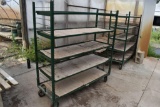 Metal rolling 5 tier shelf unit , located in Building 94