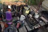 Assortment of planters , located in GH 197