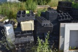 Large assortment of planter trays and carrying cases