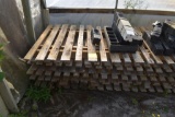 Assortment of wooden greenhouse garden benches , located in GH 231