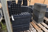 Assortment of plastic plant trays, plug trays, located in GH 24
