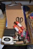 Assortment of Stamps, Stickers, and Clipboard , located in retail building