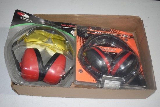 New safety glasses and hearing protection earmuffs