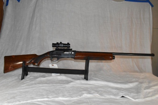 Remington Model 1100 12 GA. 2 3/4" Chamber, Semi Auto, Firefly Scope, Engravings, Gum