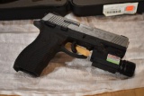 Taurus PT 809, Cal. 9mm, Nebo Protec Laser, (2) 17 Round Magazines, Case, Cleaning Rod,