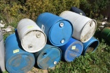 9 plastic barrels/drums