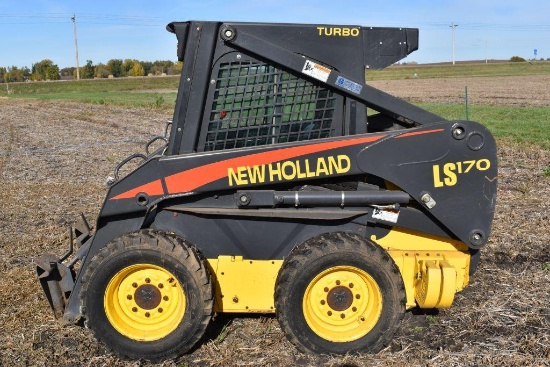 New Holland LS 170 Skid Loader, Super Boom, Turbo Diesel, Full Cab, Heat, 1375 Hours, Aux.
