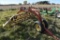 New Holland 258 hay rake, 5 bar, rubber mount teeth, dolly front