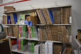 28' of wall mount peg hole store shelving