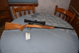 Browning T- Bolt 22 cal LR bolt action rifle, deluxe checkered stock, with Redfield Revolution