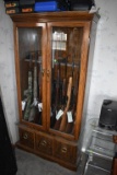 10 Place gun cabinet, glass doors, bottom storage