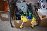 Assorted watering wands, sprinklers, and other watering items